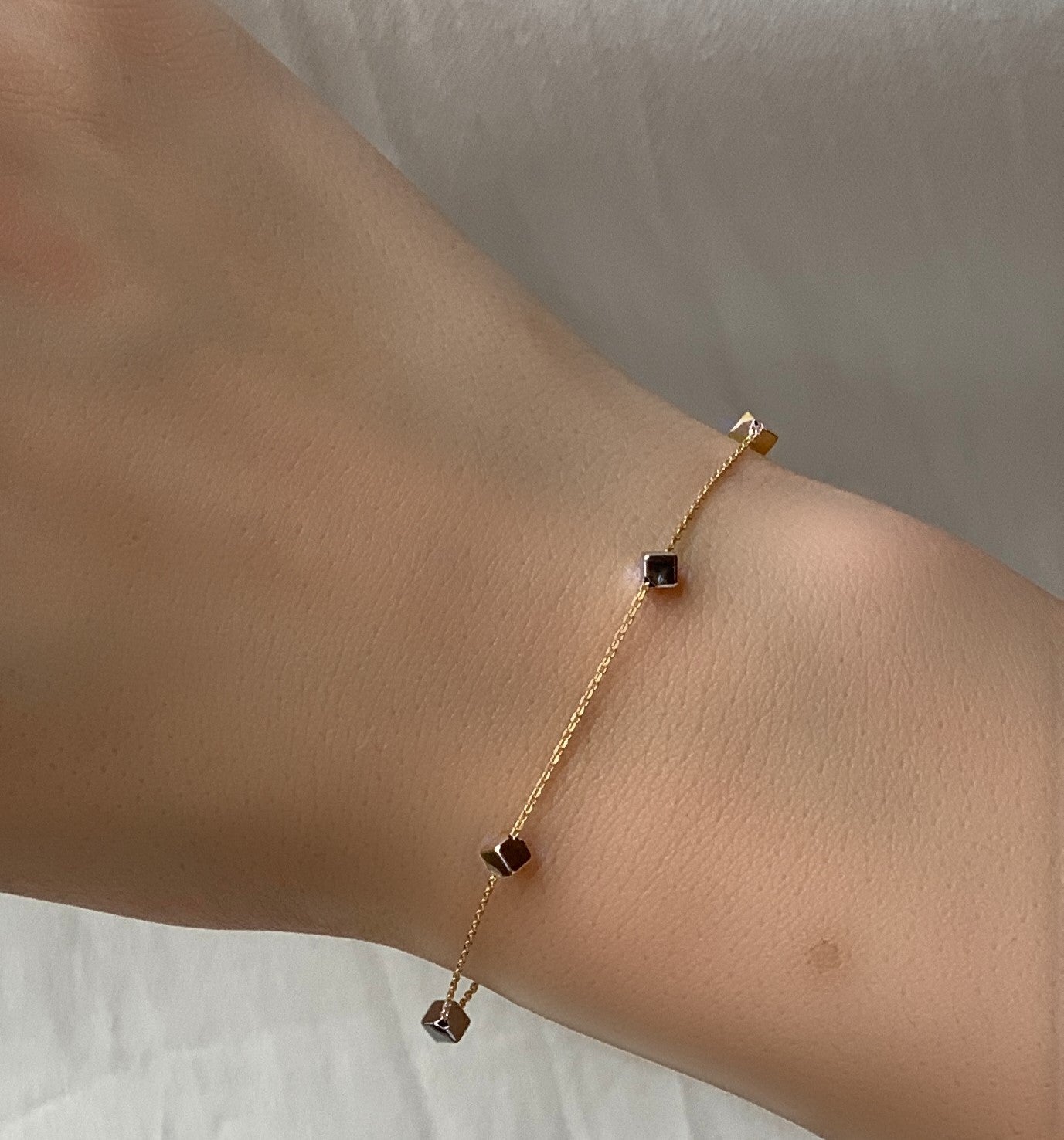 Gold cube bracelet