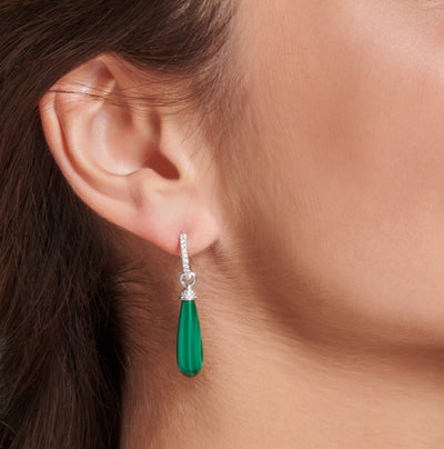 White gold, diamonds and malachite creoles.