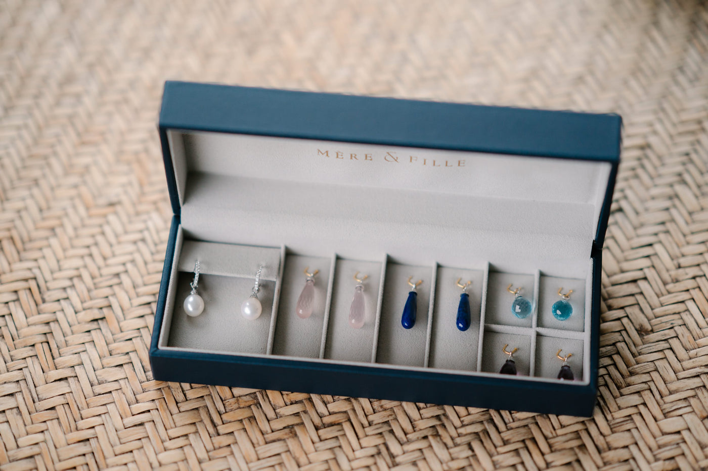 Lapis lazuli and diamond pendants.