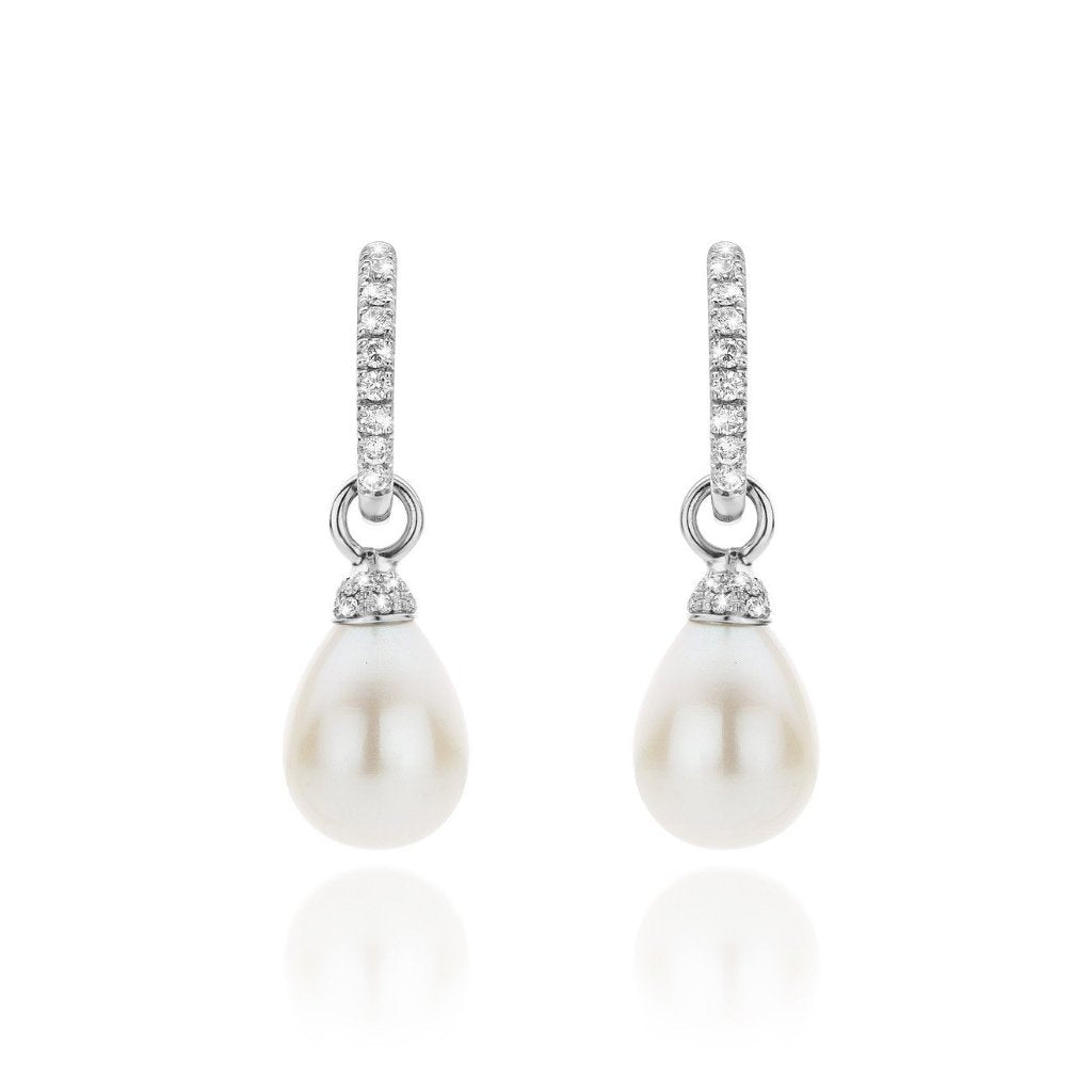 Créoles or blanc, diamants et perle.